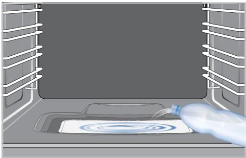 BEKO BCBIS14300MPSE - Nettoyage du bassin d'eau à la base du four - 1