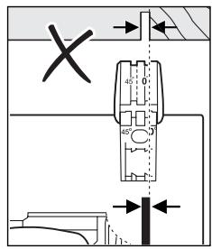 Technical diagram showing mechanical assembly with dimension annotations and cross symbol