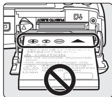 NIKON COOLPIX S52C - Inserting the Battery into the Camera - 3