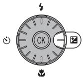 NIKON COOLPIX S600 - Press the rotary multi selector ☑ (exposure compensation). - 1