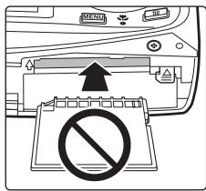 Diagram showing a device with a prohibition symbol and an arrow pointing to a labeled component, likely indicating a warning or prohibition.