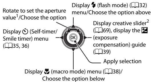 Rotate to set the aperture value¹/Choose the option Display (Self-timer/ Smile timer) menu (35, 36) Display (flash mode) (32) menu/Choose the option above Display creative slider² (69), display the (exposure compensation) guide (39) Apply selection Display (macro mode) menu (38)/ Choose the option below