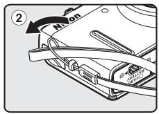 Diagram showing a device with labeled components and an arrow indicating rotation or change, marked with circled number 2.
