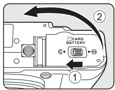 NIKON COOLPIX P7000 - Open the battery-chamber/memory card slot cover. - 1