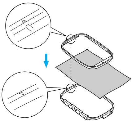 BROTHER INNOV-IS 700E - Press the inner frame in from the top of the fabric. - 1