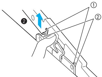BROTHER INNOV-IS 700E - While pushing the lever of the embroidery frame holder to the left, lift the embroidery frame up to remove it. - 2