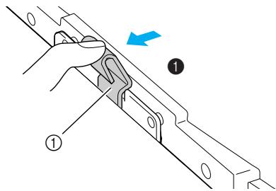 BROTHER INNOV-IS 700E - While pushing the lever of the embroidery frame holder to the left, lift the embroidery frame up to remove it. - 1