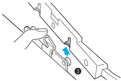 BROTHER INNOV-IS 700E - While pushing the lever of the embroidery frame holder to the left, lift the embroidery frame up to remove it. - 3