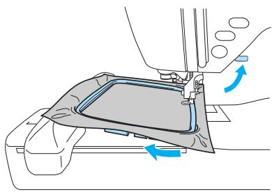 BROTHER INNOV-IS 700E - Pass the embroidery frame under the embroidery foot while raising the presser foot lever even further. - 1