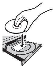 PIONEER DV-320-S - Fare après il piatto portadisco e caricare un disco. - 1