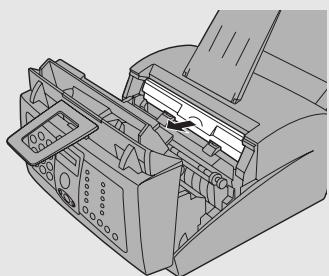 SHARP FO-3150 - Grasp the finger hold on the toner cartridge handle where it is marked PUSH, and pull the handle out. Rehold the handle and pull the toner cartridge out of the compartment. - 1