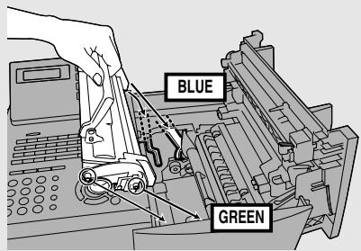 SHARP FO-5900 - Hold the toner cartridge by the handle and insert it into the print compartment. - 1