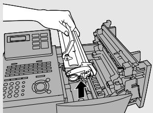 SHARP FO-5900 - Remove the toner cartridge and place it on a sheet of paper. - 1