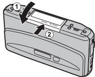 FUJIFILM FINEPIX REAL 3D W1 - Close the battery-chamber cover. - 1