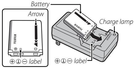 FUJIFILM FINEPIX T200 - Place the battery in the supplied battery charger. - 1