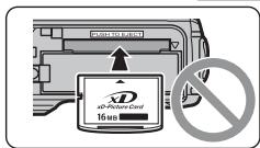 FUJIFILM FINEPIX F40FD - Insert an xD-Picture Card. - 2