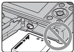 FUJIFILM FINEPIX F40FD - Load the battery. - 2