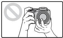 FUJIFILM FINEPIX L55 - Comment tenir l'appareil photo - 2