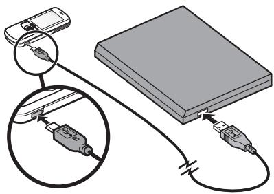 NOKIA 8600 - Cargar la batería con el cable para datos CA-101 - 1