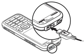 NOKIA 5630 - ■ Opladning af batteriet - 1