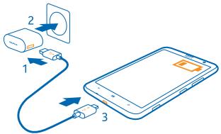 NOKIA LUMIA 1320 - Charge your phone with a USB charger - 1