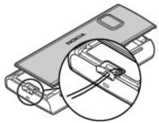 NOKIA X6 16 GB - Attach a wrist strap - 1
