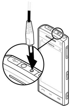 NOKIA X6 16 GB - Charge the battery - 1