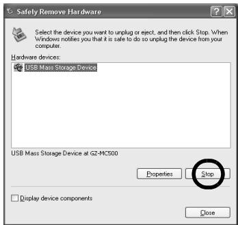 JVC GZ-MG57 - Sélectionnez [USB Mass Storage Device] ou [USB Disk], puis cliquez sur [Arrêter]. - 1