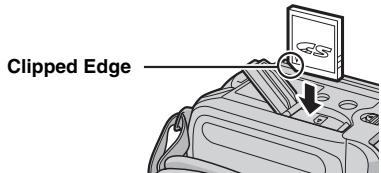 JVC GZ-MG47E - Firmly insert the card with its clipped edge first. - 1