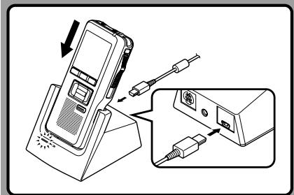 OLYMPUS DS-5000 - Turn the recorder's POWER switch OFF (P.20) and firmly press the recorder all the way into the cradle as shown in the illustration. - 1