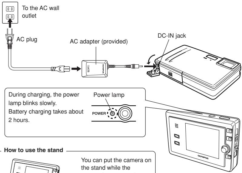 OLYMPUS AZ-2 ZOOM - Charging the battery - 1