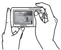OLYMPUS µ 740 - a. Hold the camera - 2