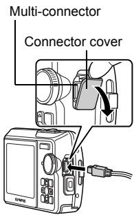 OLYMPUS µ 740 - Connect the multi-connector on the camera to the USB port on the computer using the provided USB cable. - 1