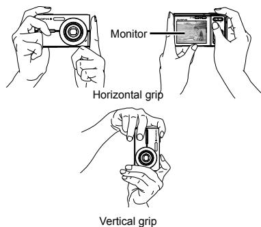 OLYMPUS FE-360 - Hold the camera and compose the shot. - 1