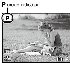 OLYMPUS FE-360 - Press the button. - 1