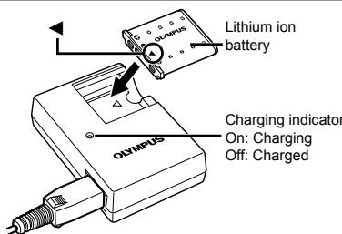 OLYMPUS Μ 1060 - Charging the battery - 3