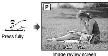 OLYMPUS Μ 1060 - To take the picture, gently press the shutter button all the way down while being careful not to shake the camera. - 1