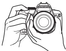 OLYMPUS E-450 - Holding the camera - 1