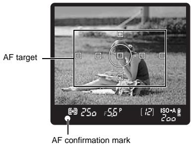 OLYMPUS E-620 - Adjust the AF target with the subject to be focused and press the shutter button halfway until the AF confirmation mark lights up. - 2