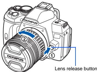 OLYMPUS E-620 - Removing the lens from the camera - 1
