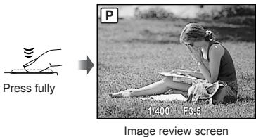 OLYMPUS STYLUS TOUGH 8000 - Press the shutter button halfway down to focus on the subject. - 2