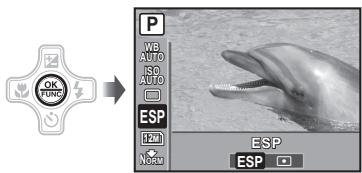 OLYMPUS STYLUS TOUGH 8000 - Press the button. - 1