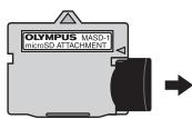 OLYMPUS STYLUS TOUGH 8000 - Insert the microSD Attachment into the camera. - 2