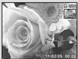 OLYMPUS TG-310 - Press the zoom buttons. - 3