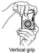 OLYMPUS T-100 - Hold the camera and compose the shot. - 2