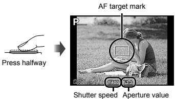 OLYMPUS TG-1 - Press the shutter button halfway down to focus on the subject. - 1