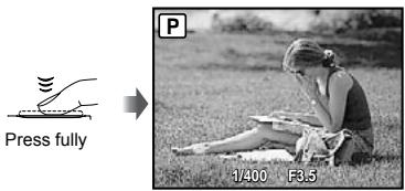 OLYMPUS Μ-550WP - Press the shutter button halfway down to focus on the subject. - 2