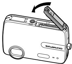 OLYMPUS Μ-550WP - Loading the battery and the xD-Picture Card™ (sold separately) into the camera - 4