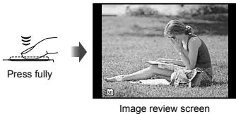 OLYMPUS TG-820 - Press the shutter button halfway down to focus on the subject. - 2