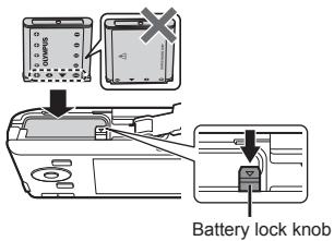 OLYMPUS VG-180 - Insert the battery while sliding the battery lock knob in the direction of the arrow. - 1